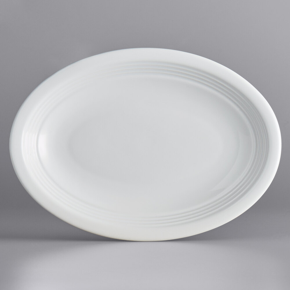 Acopa Capri 9 3/4" x 7" Coconut White Oval Stoneware Coupe Platter - Sample