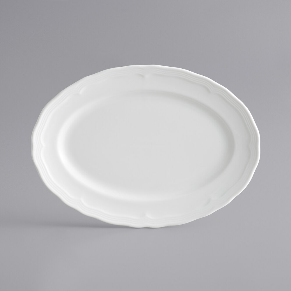 Acopa Condesa 9 3/4" x 7" Pearl White Scalloped Wide Rim Porcelain Platter - Sample