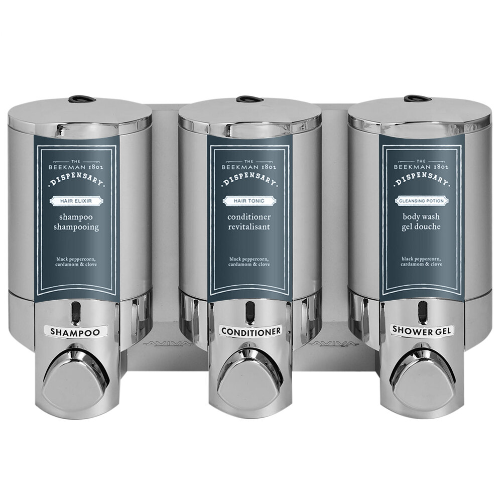 Dispenser Amenities 37344-BKMN Aviva 30 oz. Chrome 3-Chamber Wall Mounted Locking Shower Dispenser with Satin Silver Bottles and Beekman Logo