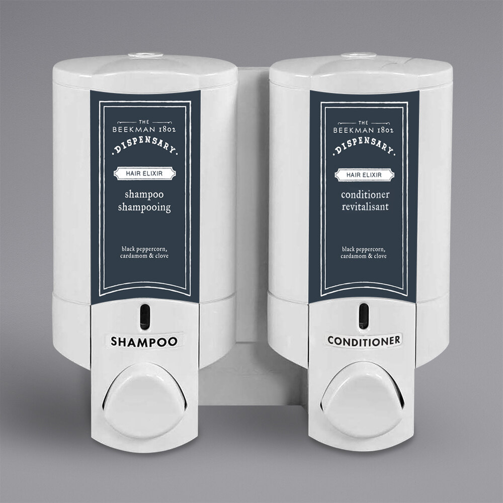 Dispenser Amenities 37250-BKMN Aviva 20 oz. Solid White 2-Chamber Wall Mounted Locking Shower Dispenser with Bottles and Beekman Logo