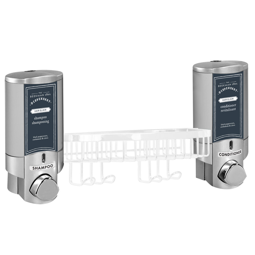 Dispenser Amenities 36254-14BSK-BKMN Aviva 20 oz. Satin Silver 2-Chamber Wall Mounted Locking Soap Dispenser with Satin Silver Bottles, White Basket, and Beekman Logo