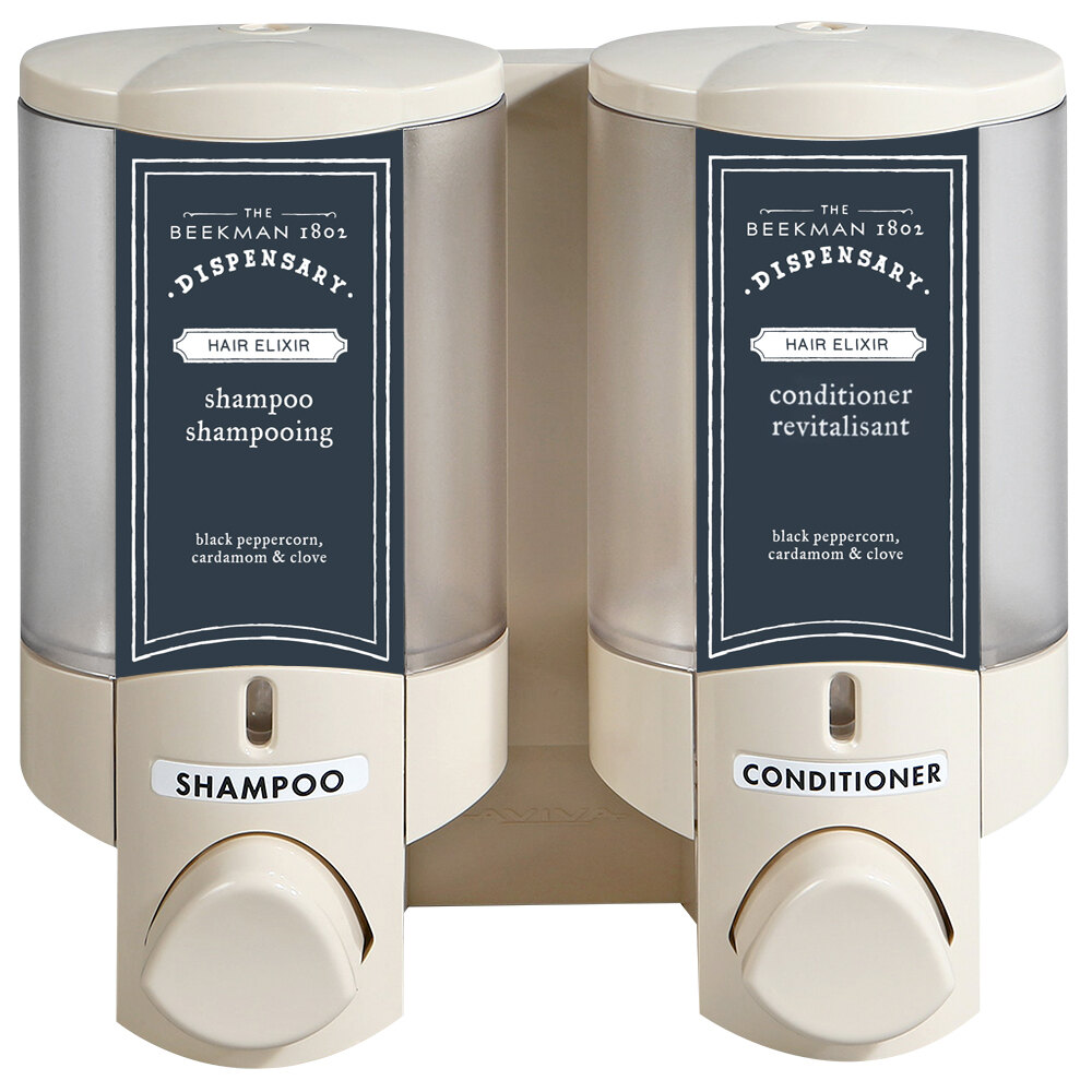 Dispenser Amenities 36270-BKMN Aviva 20 oz. Vanilla 2-Chamber Wall Mounted Locking Soap Dispenser with Translucent Bottles and Beekman Logo