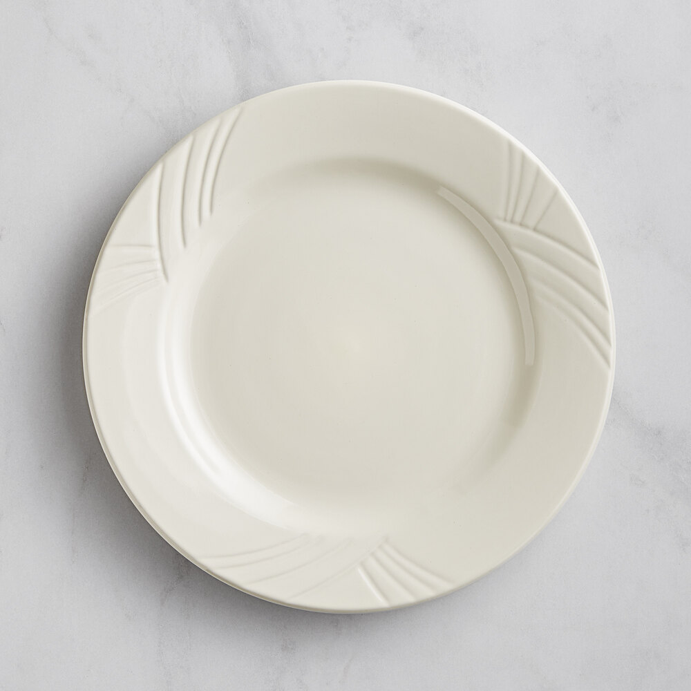 Acopa Swell 10 1/2" Ivory (American White) Embossed Wide Rim Stoneware Plate - Sample