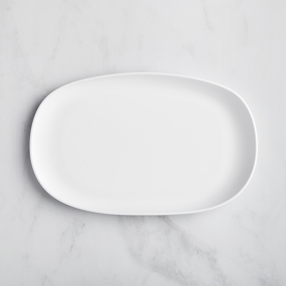 GET Riverstone 12" x 7 1/2" White Irregular Oval Matte Melamine Coupe Plate - Sample